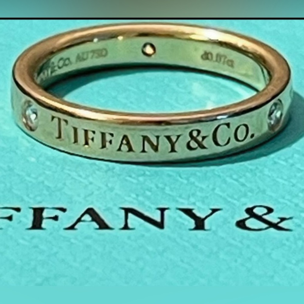 100% Authentic Tiffany 18KT Ring with Three Diamonds
